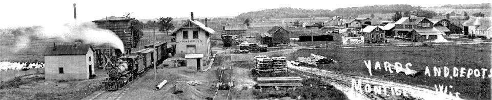 Monticello train depot and steaming engine.