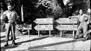 Intersection in the center of the capital of Luxembourg, Luxembourg City. The signs point the way to locations in Belgium, France and Germany.