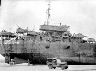 When the absence of gas warfare had been confirmed, the company joined  other service troops in policing the beach and unloading ammunition.