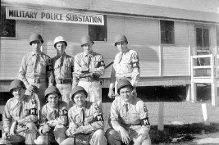 Tom Brusveen, third from left in front row.