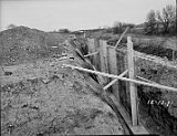 Laidlaw Corporation broke ground on November 3, 1971, moved their equipment here from Peoria, Ill., and began production on June 26, 1972. The old Woolen Mill bridge is in the background.</p></h5>