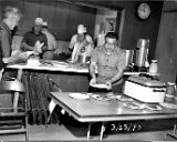 Monticello Lions pancake breakfast fund raiser.  Left, Woodrow Pryce, 2nd from left, facing camera, Rolland Buchholz, 3rd from left, facing camera, Richard Smith, far right, Ben Campa.