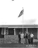 The Legionaire in the light suit is Ernie Strause, 4th from left is Wis. Assemblyman Gordon Roseleip..  This may have been the official dedication of the Legion Post building attended by District Commanders and other dignitaries.