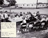 Furthest table, right end is Thomas Runkle Sr.  This side of furthest table is Joe Legler, Herbert Kubly, ?,? Calvin Drafahl.   Fromt, seated: First lady is Jean Blumer, not Patty Strause.