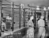 Fritz and Genevieve Escher, Monticello cheesemaker, inspect the new auction building.</P